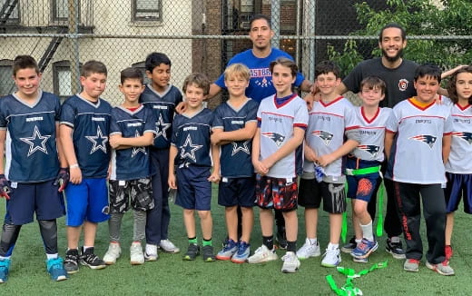 a group of kids posing for a photo