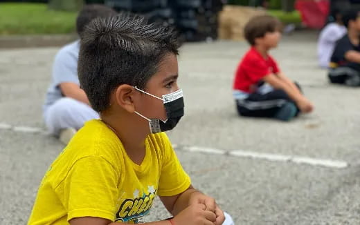a young girl wearing a headset