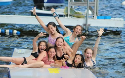 a group of people in a pool