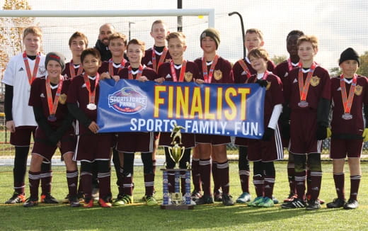 a group of people holding a banner