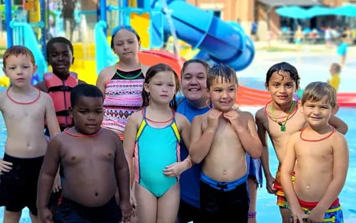 a group of children posing for a photo