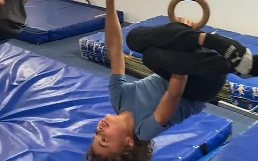 a person lying on a bed