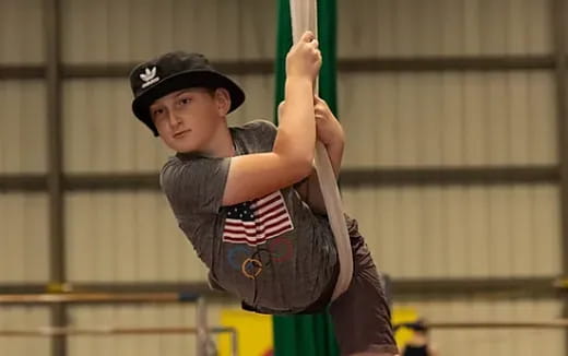 a young boy playing baseball