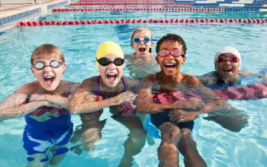 a group of people in a pool