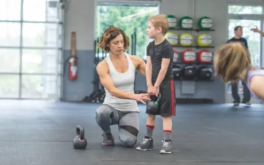 a person and a boy playing a game