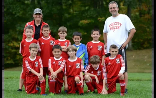 a group of people posing for a photo