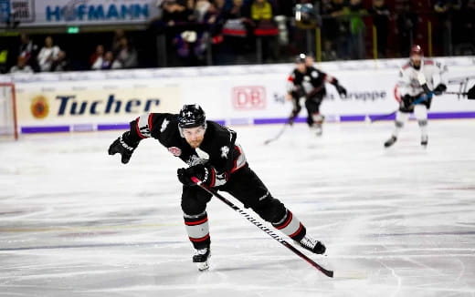 a hockey player in a uniform