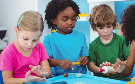 a group of children playing with toys