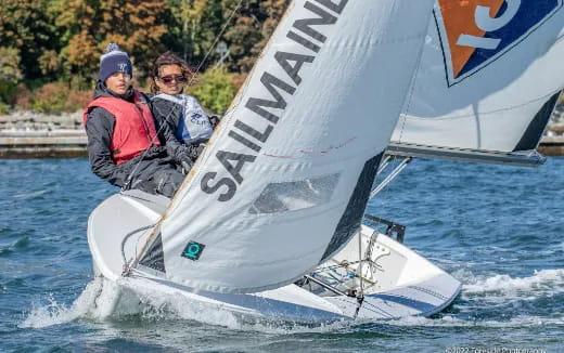 a group of people on a sailboat