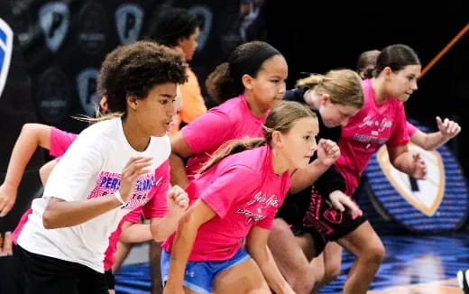 a group of people in a gym