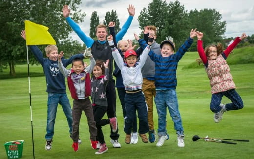 a group of people jumping in the air