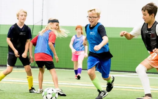 a group of people playing football