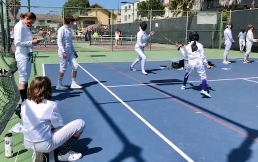 a group of people playing a sport