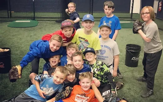 a group of kids posing for a photo