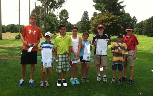 a group of people posing for a photo
