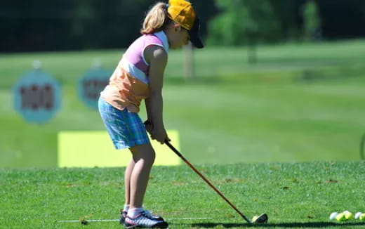 a person playing golf