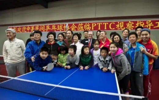 a group of people posing for a photo
