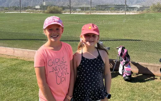 a group of girls posing for a picture