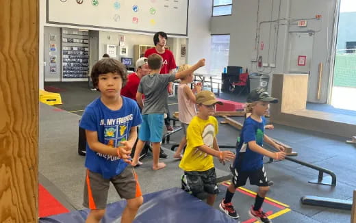 a group of kids playing in a room