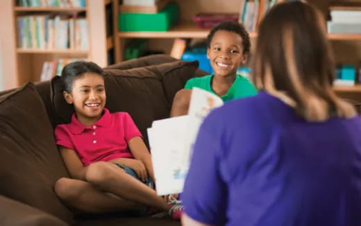a group of people sitting on a couch