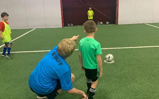 a group of boys playing football