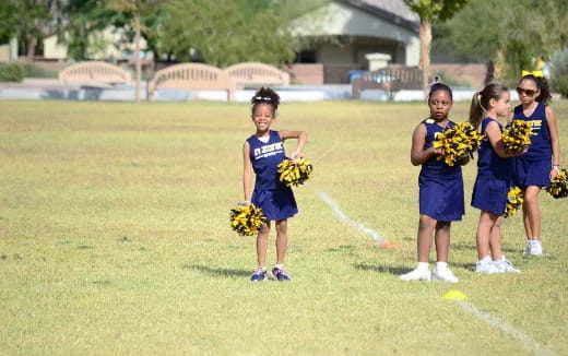 a group of girls holding flowers