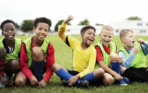 a group of boys in football uniforms