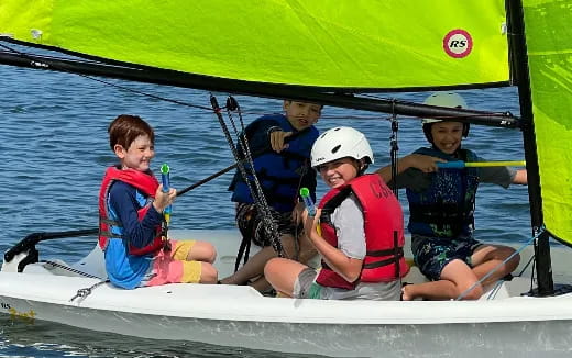 a group of people in a boat