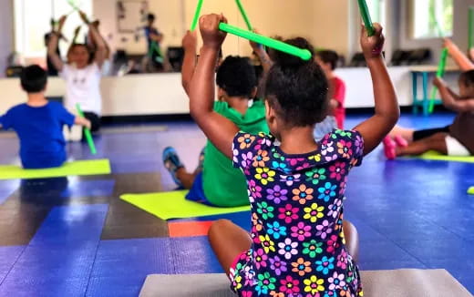 a group of children exercising