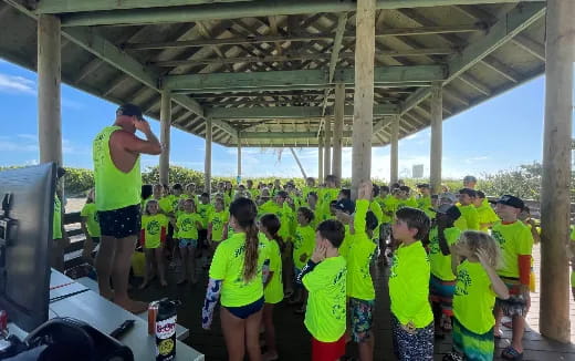 a group of people standing in a room