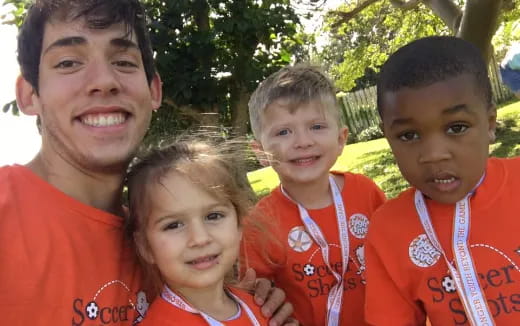 a group of people posing for the camera