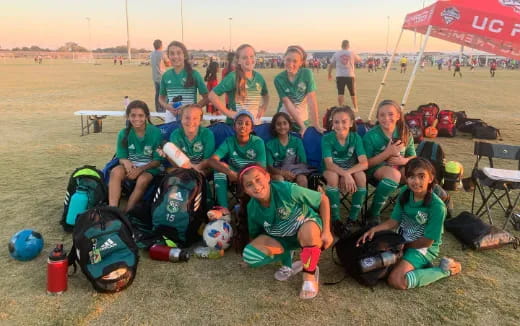 a group of people posing for a photo