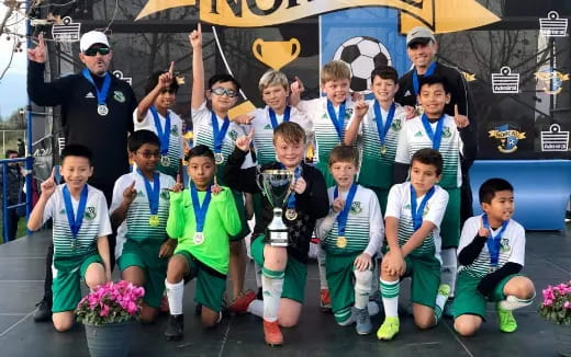 a group of people posing for a photo