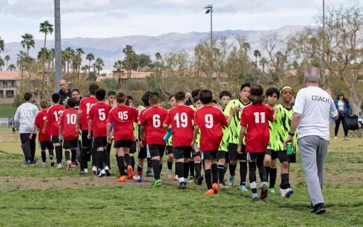 a group of people in sports uniforms