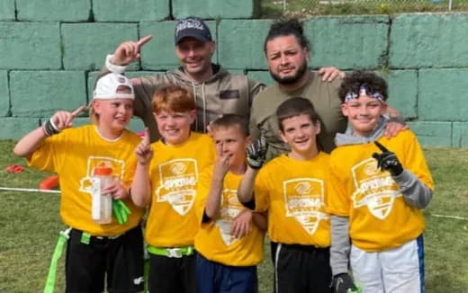 a group of people posing for a photo