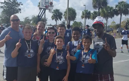 a group of people posing for a photo