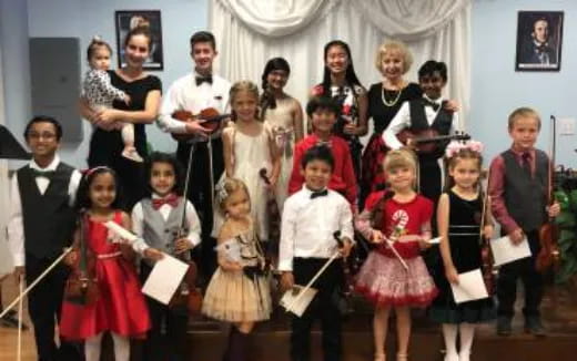 a group of people posing for a photo