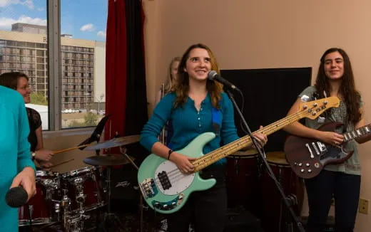 a group of people playing instruments