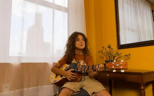 a woman sitting on a couch