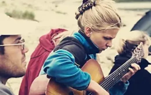 a man holding a baby