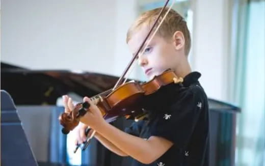 a person playing a violin