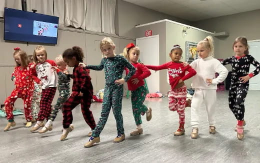 a group of children dancing