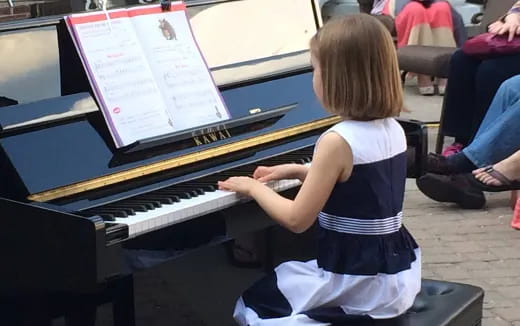 a child playing a piano