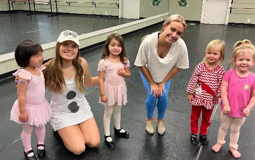 a group of people posing for a photo