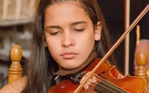 a person playing a violin