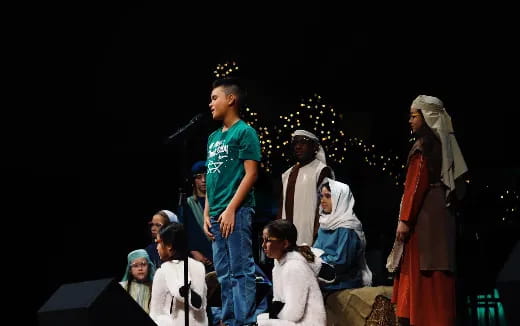a group of people on a stage