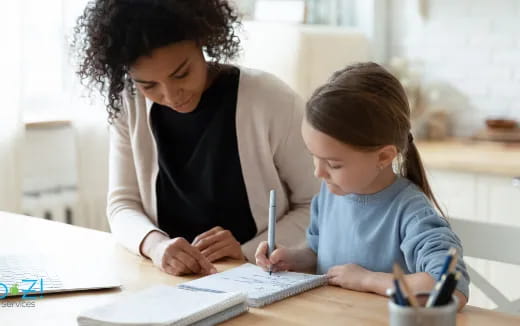 a person and a child writing on paper