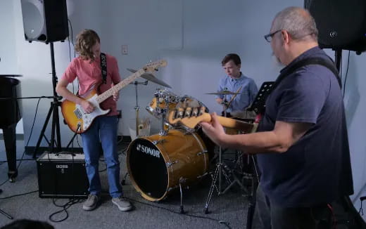 a group of people playing instruments
