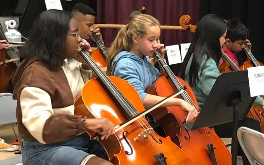 a group of people playing instruments