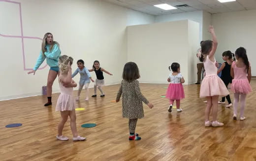 a group of children dancing